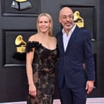 Chelsea Handler and Jo Koy arrive for the 64th annual Grammy Awards at the MGM Grand Garden Arena in Las Vegas, Nevada on Sunday, April 3, 2022.