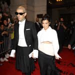 Kourtney Kardashian and Travis Barker share their wedding pics