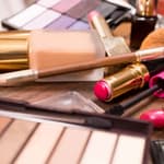 Assorted makeup products on a surface
