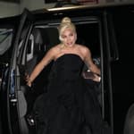 Lady Gaga wears a black gown as arriving at TAO for Film Critic Awards on March 16 2022