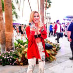 Bella Thorne Looks Sexy In Red While Enjoying Herself At Coachella in Indio CA