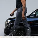 Newly single Kanye West and girlfriend Chaney Jones leave their hotel in Miami and are followed by a pretty blonde who also traveled with them in Miami