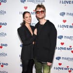 Claudia Sulewski and Finneas O'Connell on the red carpet