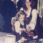 Portrait of Elvis & Priscilla Presley with their daughter