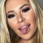 Kindly Myers poses in green lingerie