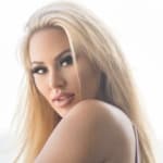 Kindly Myers in purple lingerie