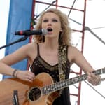 Taylor Swift performs live earlier in her career at KISS Country Chili Cookoff 2008 in Pembroke Pines Florida