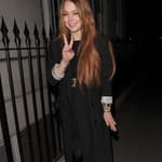 Lindsay Lohan enjoys dinner at apos C apos restaurant in Mayfair with a male companion The pair appeared close with Lindsay showing the man pictures on her phone