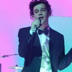 Matty Healy performing with his band The 1975