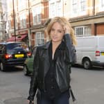 Mena Suvari out and about promoting her new film apos The Knot apos The American Pie actress wore a black leather jacket ripped jeans black shirt and black boots