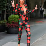 Lisa Rinna wore a rose-print YSL catsuit as leaving her hotel in New York City