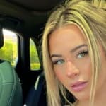 Emily Elizabeth taking a selfie.