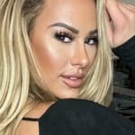 Kindly Myers in a black bodysuit