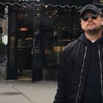 Leonardo DiCaprio helps out a lost tourist with directions in NYC