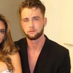 Georgia Hassarati in daring white dress with Harry Jowsey