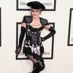 See Madonna Hold Up Sign For Her Family's House Rules