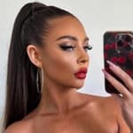 Larissa Trownson Is A ‘Cherry Bomb’ In Her Strapless Black Corset