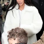 Kim Kardashian seen at a rainy London eye with her kids filming for her new tv series