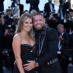Conor McGregor and Dee Devlin on the Elvis red carpet at the Cannes film festival