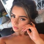 Demi Rose takes a selfie.
