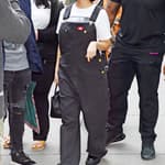 Kourtney Kardashian heads out in a Blink-182 t-shirt and overalls