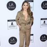 Brittney Palmer Lets Her Buns Hang Out In Green Dress