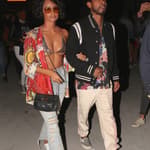 Singer Miguel and his girl at neon carnival