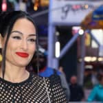 WWE wrestler Nikki Bella seen kissing her husband Artem Chigvintsev after making an appearance on Good Morning America in New York City