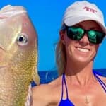 Vicky Stark shows off her big catches in a tiny blue bikini.