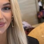 Veronika Rajek smiles at the camera.