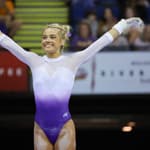 March 3, 2023: LSU's Olivia Dunne salutes prioir to her bar routine at the LSU Podium Challenge collegiate woman's gymnastics meet at the River Center in Baton Rouge, LA. Kyle Okita/CSM(Credit Image: © Kyle Okita/Cal Sport Media) Newscom/(Mega Agency TagID: csmphotothree057215.jpg) [Photo via Mega Agency]