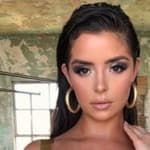 Demi Rose poses for the camera.
