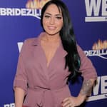 Angelina Pivarnick poses on the red carpet at WEtv's Premiere Fashion Event Celebrating the Return of Bridezillas