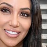 Melissa Gorga smiles close up