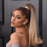 Ariana Grande in grey puffy dress