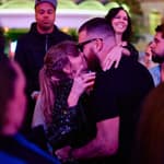 Travis Kelce and Taylor Swift kissing