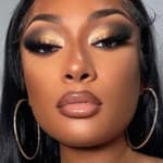 Megan Thee Stallion poses for the camera.