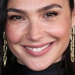 Gal Gadot smiles at an event