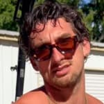 TooTurntTony smiling in sunglasses