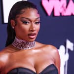 Megan Thee Stallion wearing a Brandon Blackwood dress and Jacob and Co. jewelry arrives at the 2023 MTV Video Music Awards