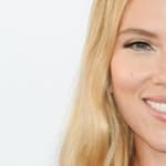 Scarlett Johansson smiles at an event
