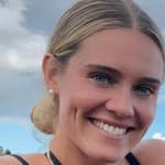 Olympics star Alysha Newman smiles to the camera.