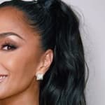 Nicole Scherzinger smiles at the camera.