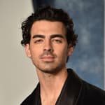 Joe Jonas arriving at the Vanity Fair Oscar Party