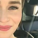 Emilia Clarke poses smiling