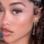 Jordyn Woods poses close up