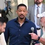 Gun toting Will Smith and Martin Lawrence film scenes for Bad Boys 4 at a police station in Miami