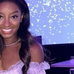Jonathan Owens and Simone Biles matching in purple outfits