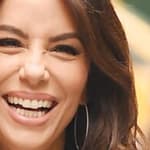 Eva Longoria laughing outdoors