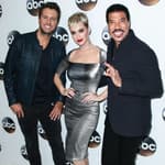 Luke Bryan, Katy Perry, and Lionel Richie smiling together